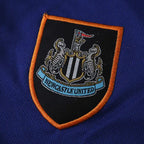 2526 season Newcastle United F.C. third Kids kit